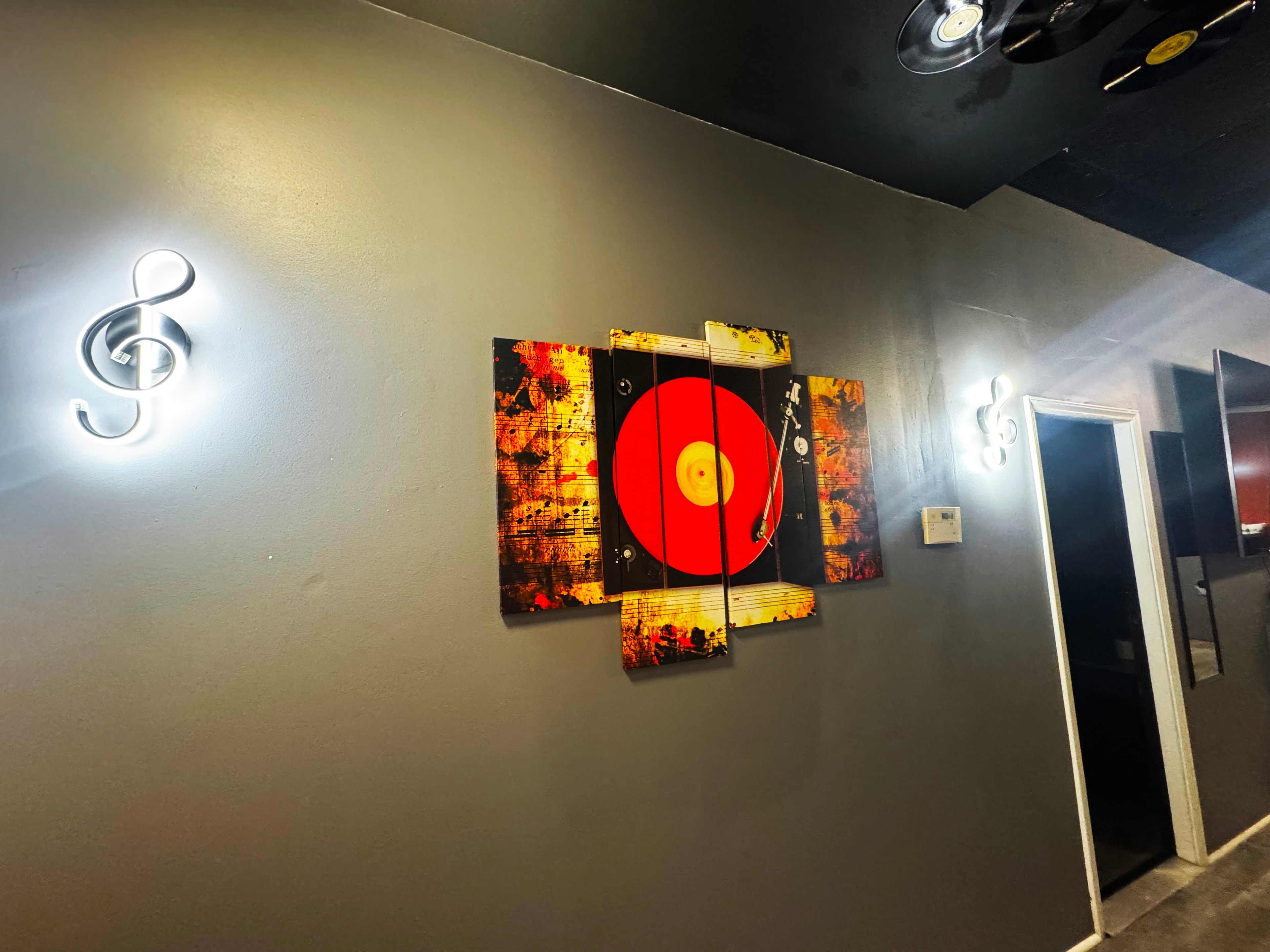 Hallway — treble clef neon lights & vinyl turntable canvas
