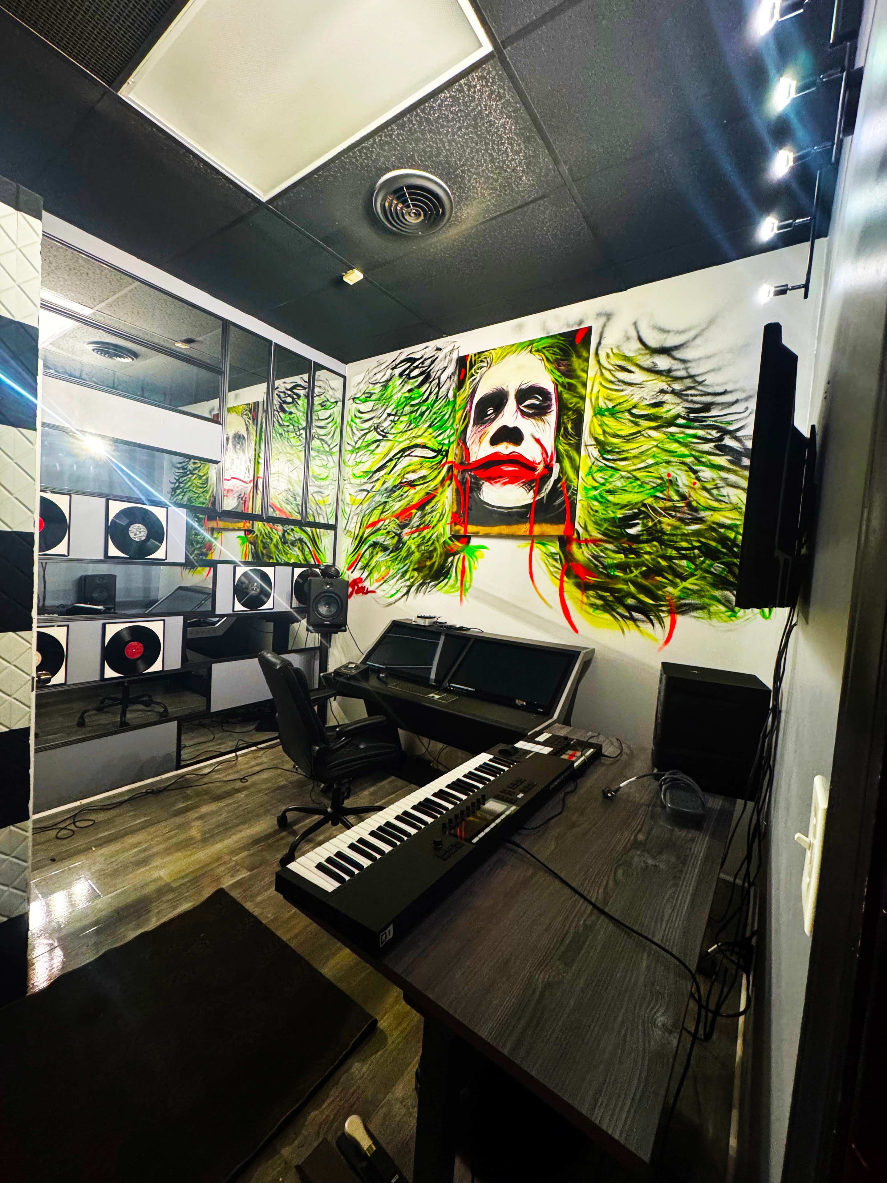 Studio A production desk, keyboard & iconic Joker mural